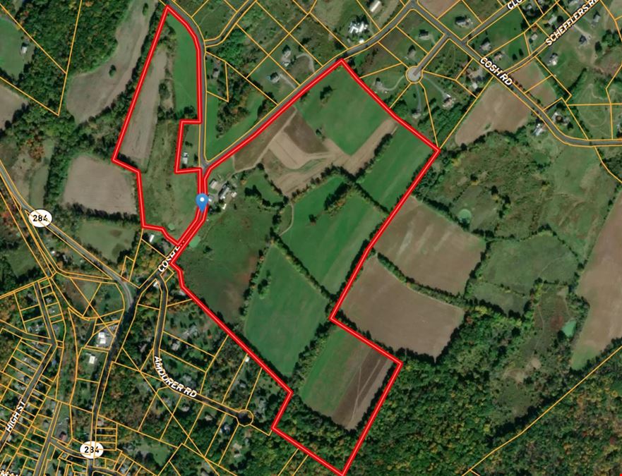 Great Land with over a half mile of road frontage and story book